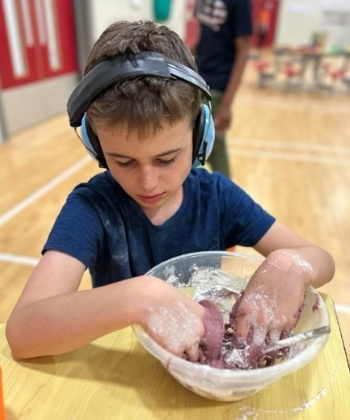 child learning to cook