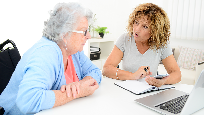 Two ladies doing admin