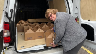 Leader of the Council loading Bexley Boxes