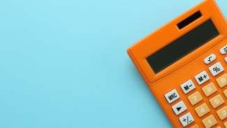 A calculator on a blue background